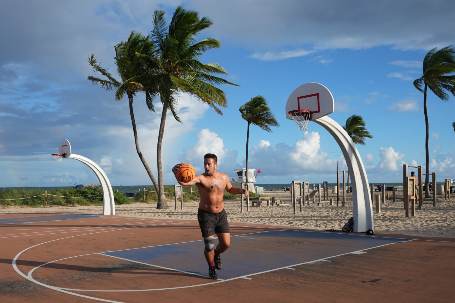 Gonzalo de Leon plays basketball at Fort Lauderdale Beach Park, the site of proposed pickleball cou...