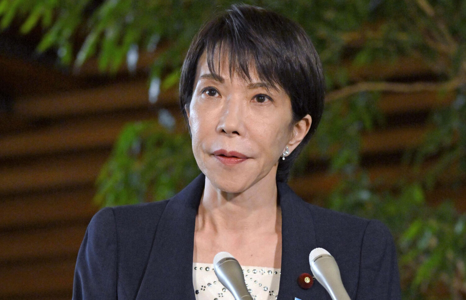 Japan Prime Minister Sanae Takaichi speaks to the media at the prime minister's office in Tokyo, We...