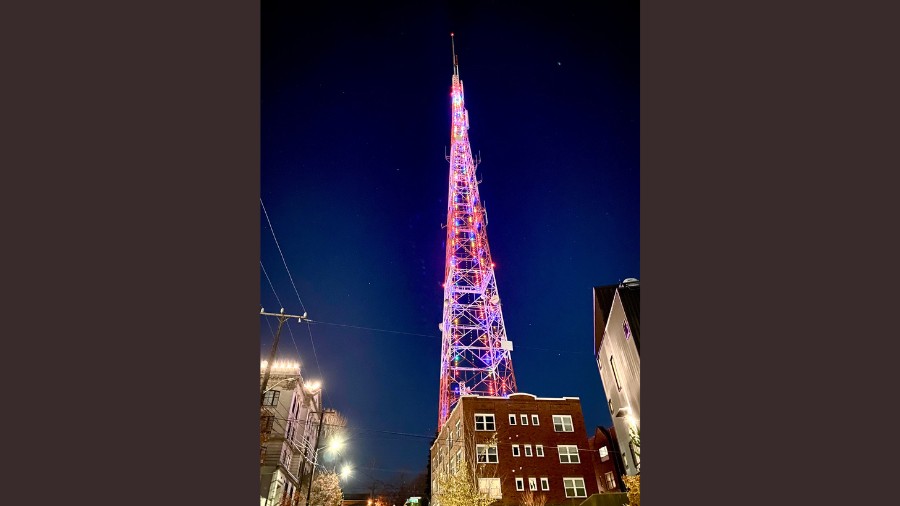 Image: The KING 5 tower atop Seattle's Queen Anne Hill has been decorated with holiday lights nearl...