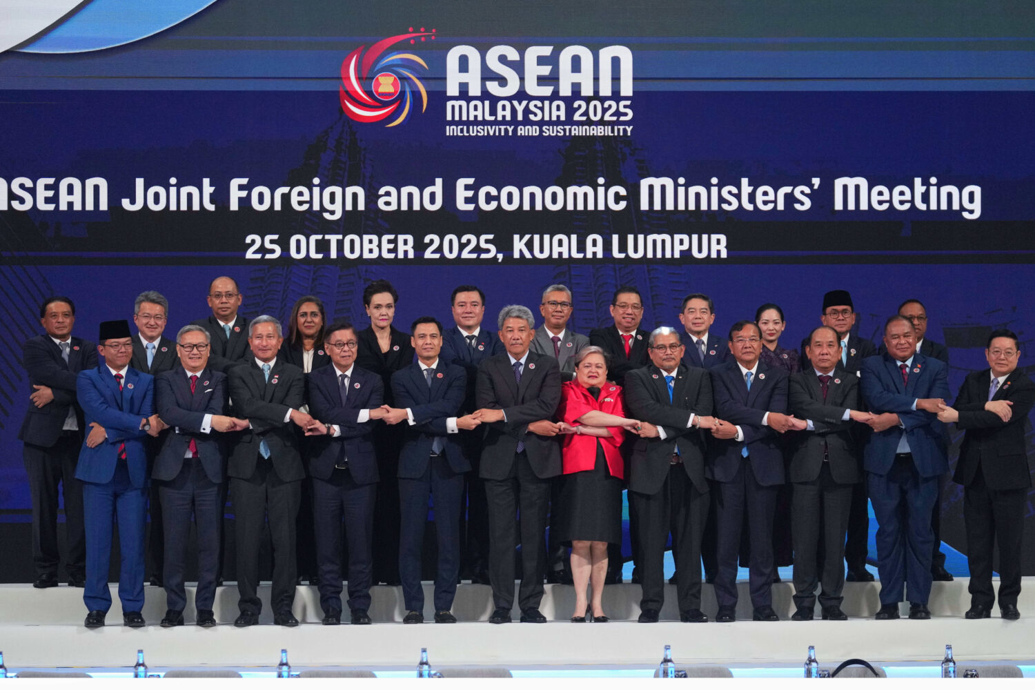 Foreign ministers and economic ministers of ASEAN member countries pose for a group photo during th...