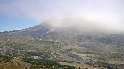 Why is ash swirling around Mount St. Helens?