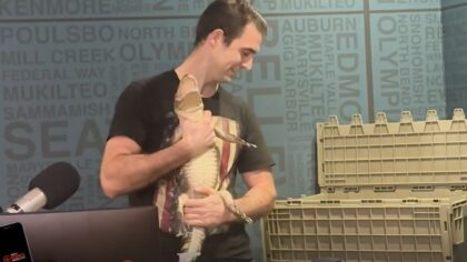 Jake and Spike make scaly friend as local reptile zoo announces reopening