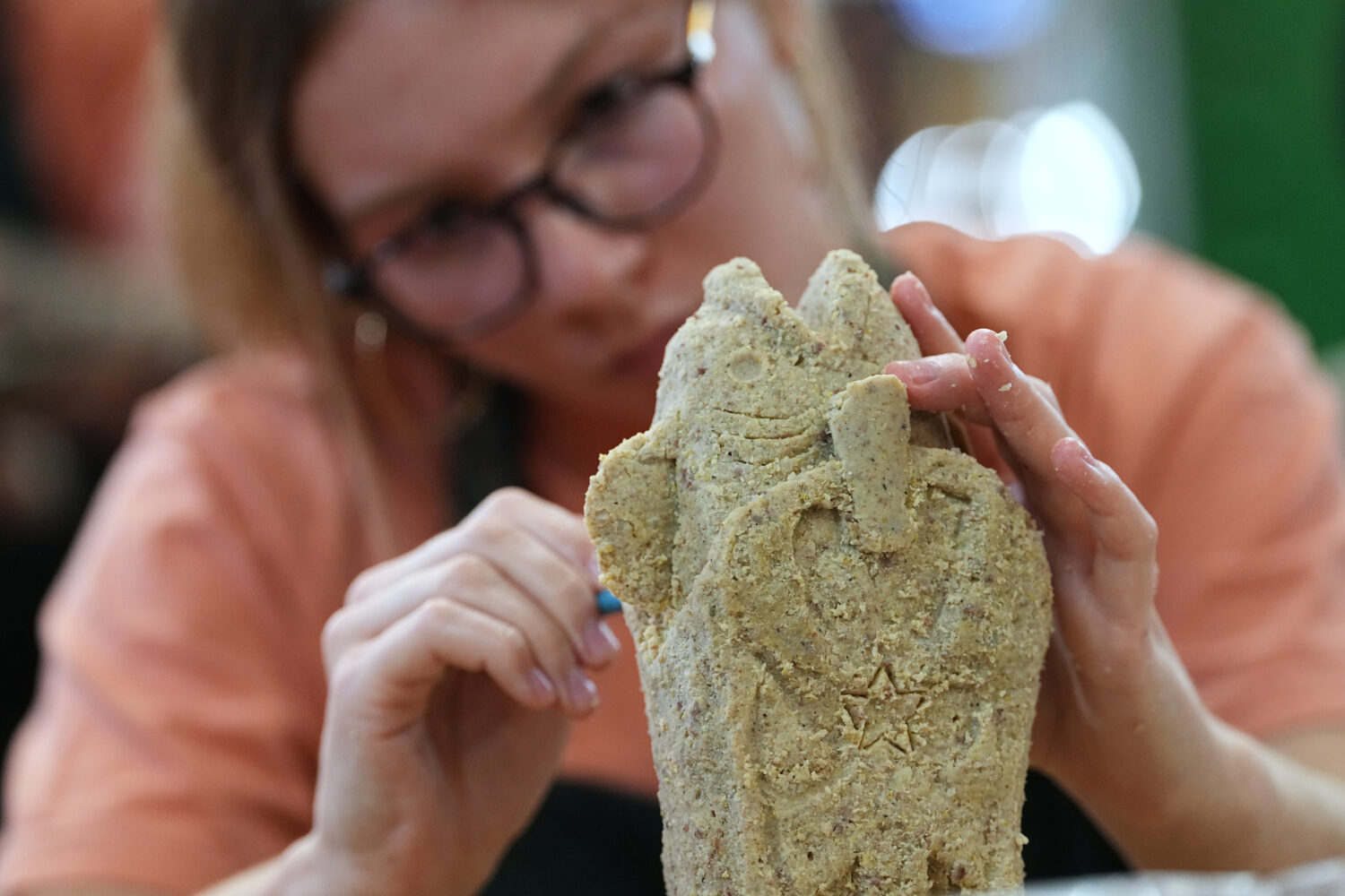 Victoria Roath works on her creation in the Scrapple Sculpting Contest at the Reading Terminal Mark...