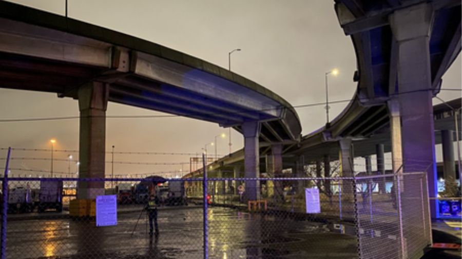 A vehicle plunged from the SR 99 off-ramp to Spokane Street Saturday night, killing one person and ...