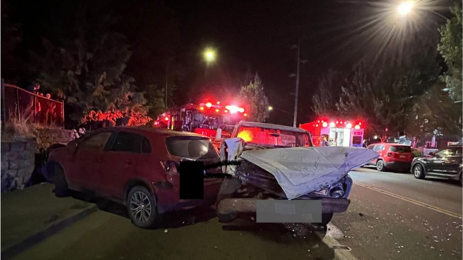 Two of more than a dozen vehicles damaged by a suspect in a stolen fire truck in Everett. (Photo: Everett Fire Dept.)
