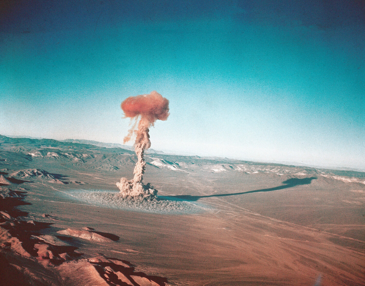 FILE - A sub-surface atomic test is shown March 23, 1955 at the Nevada Test Site near Yucca Flats, ...