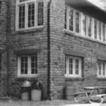 Vintage image of the lower level rear of the lodge at Camp Long. (Washington State Department of Archaeology and Historic Preservation)