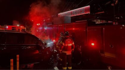 Suspected DUI driver slams into firetruck as crews battle Puyallup garage fire